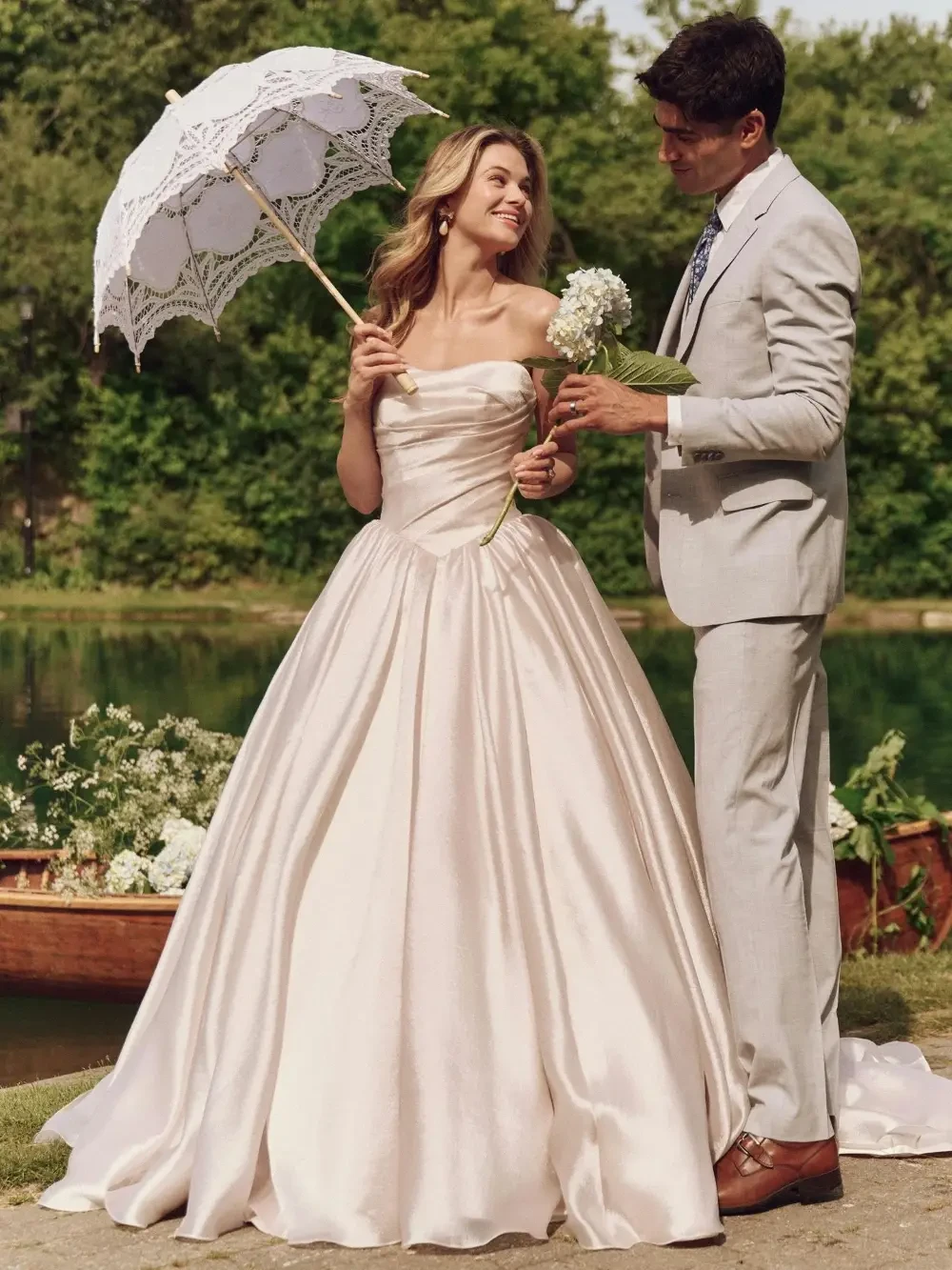 model is wearing a ball gown wedding dress